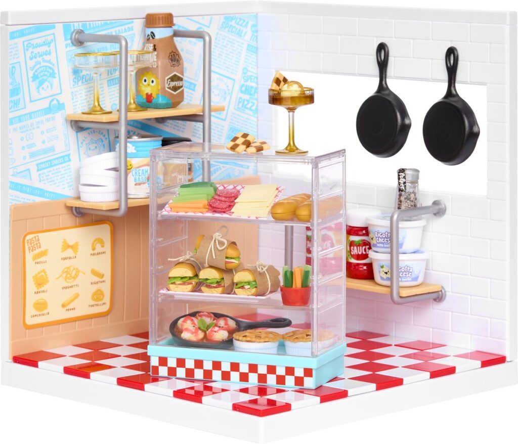 Vitrine miniature de produits fins avec des petits pains et des ustensiles de cuisine