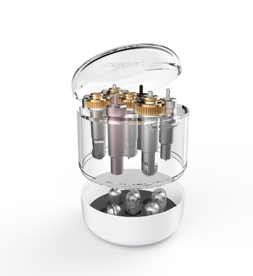 Elektrisch apparaat met verwisselbare onderdelen en doorzichtige behuizing.