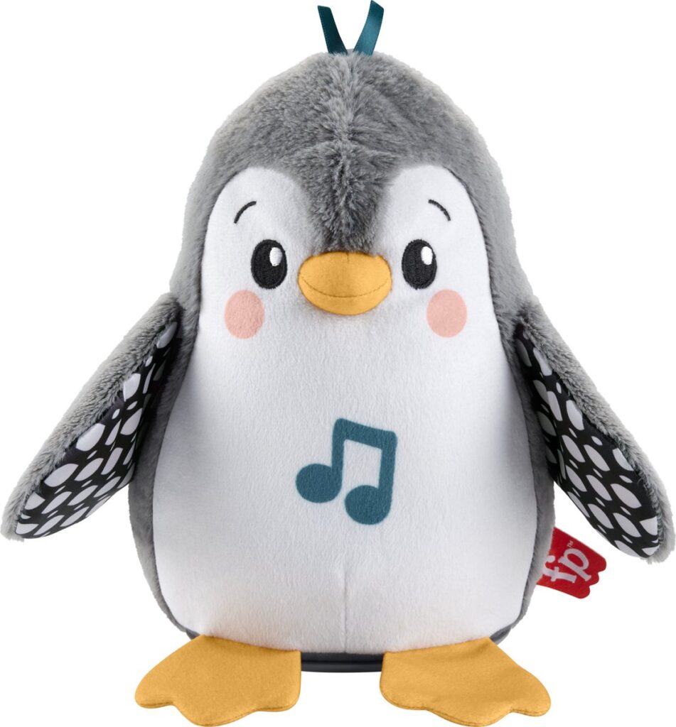 Schattige pluchen pinguïnknuffel met muzieknoot op buik.