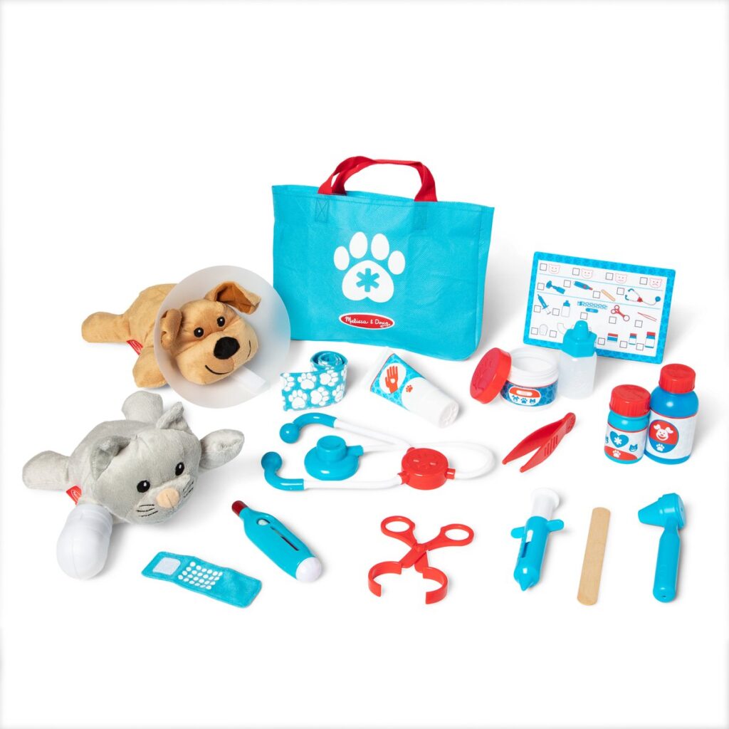 Toy vet set with a stuffed dog and cat