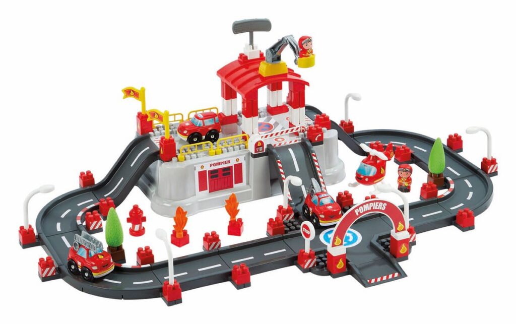 Toy fire station with cars and a helicopter