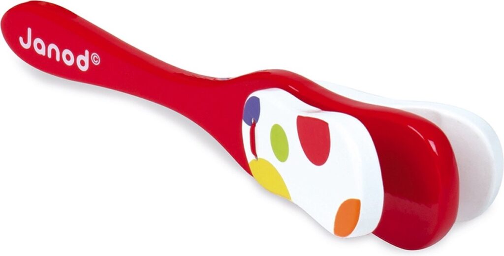 Rode gitaarstok voor kinderen met kleurvlekken