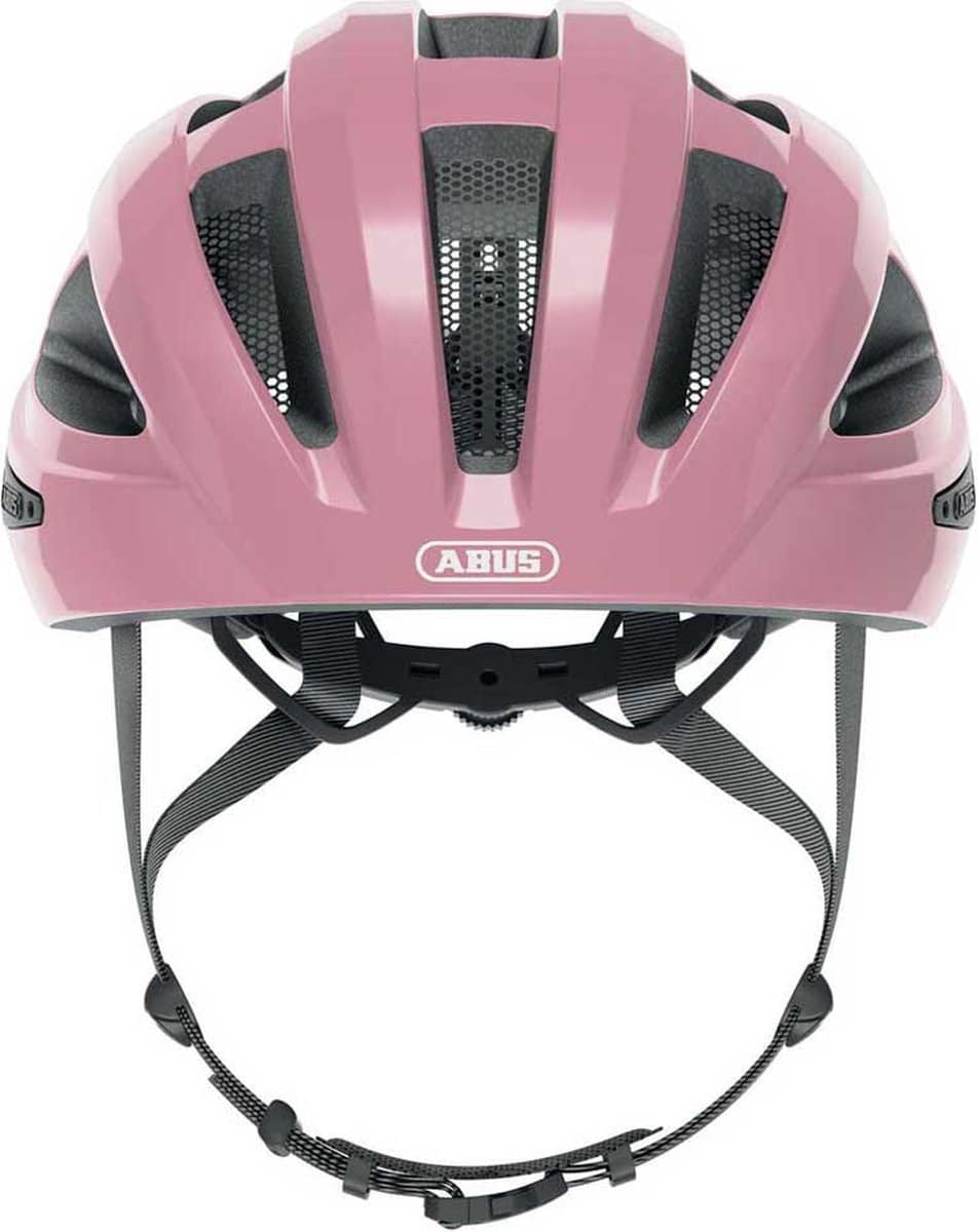 Roze fietshelm met ventilatieopeningen en verstelbare band.