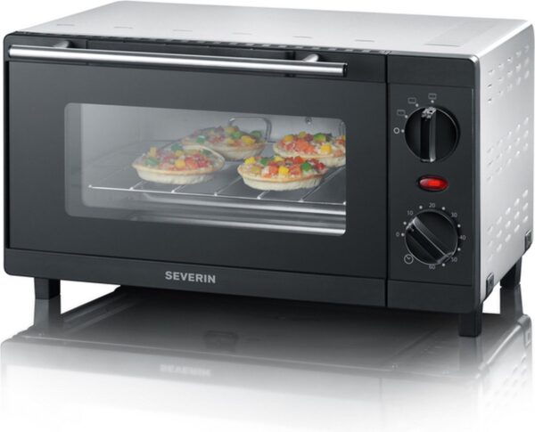 Kleine oven met mini-pizza's op een rooster.