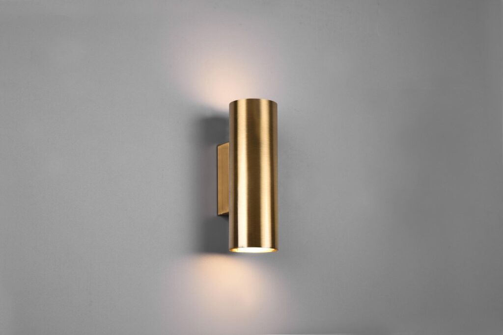 Gouden wandlamp met licht naar boven en beneden