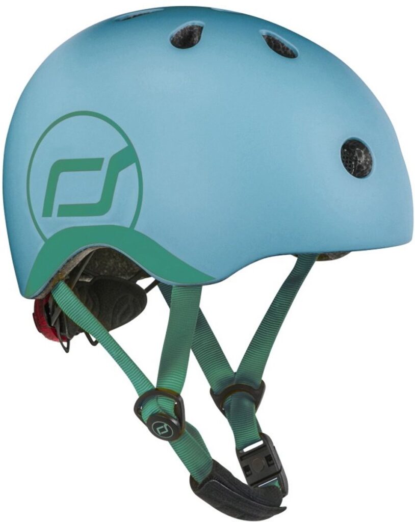 Light blue bicycle helmet with green straps