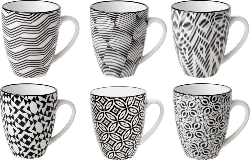 Six black-and-white mugs with geometric patterns