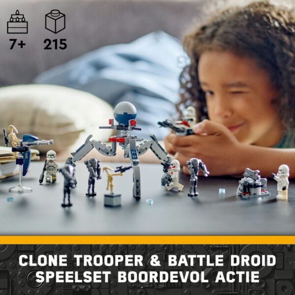 Kind speelt met Star Wars Lego speelset op tafel.