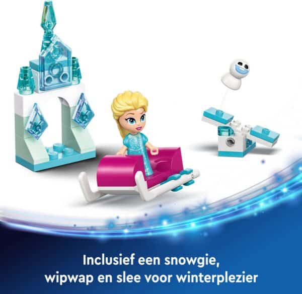 Speelgoedset met pop, slee en sneeuwfiguur winterthema.