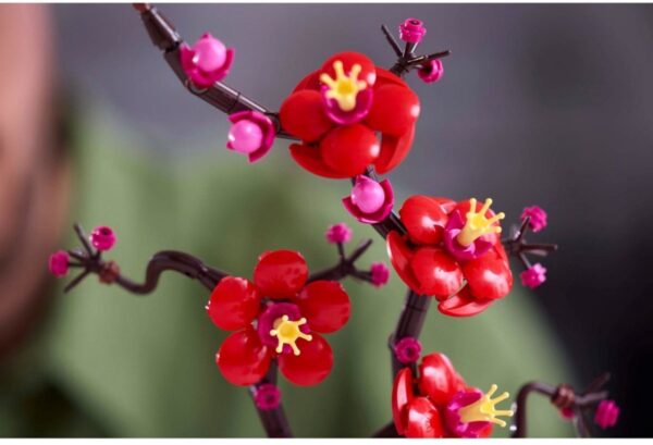 LEGO bloemen op tak, rood en roze.