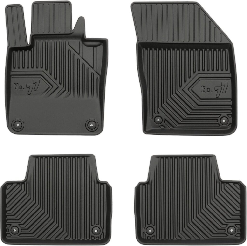 Vier zwarte rubberen automatten op witte achtergrond.