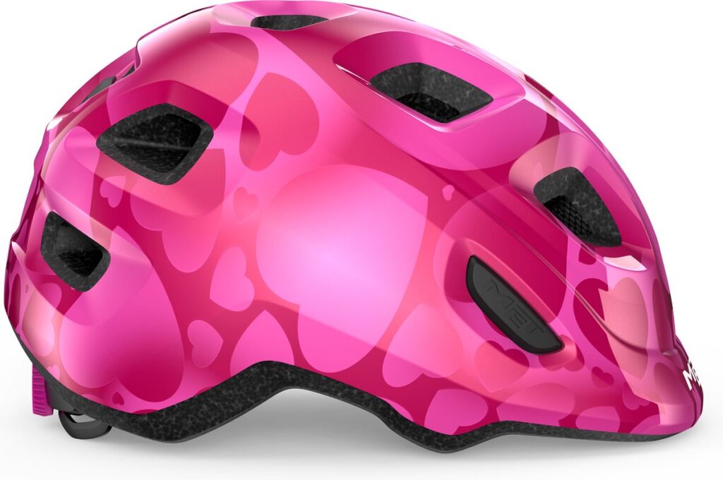 Casque de vélo rose pour enfant avec un motif de petits cœurs