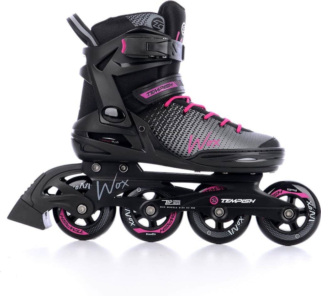 Zwart-grijze inline skates met roze accenten, zijaanzicht.