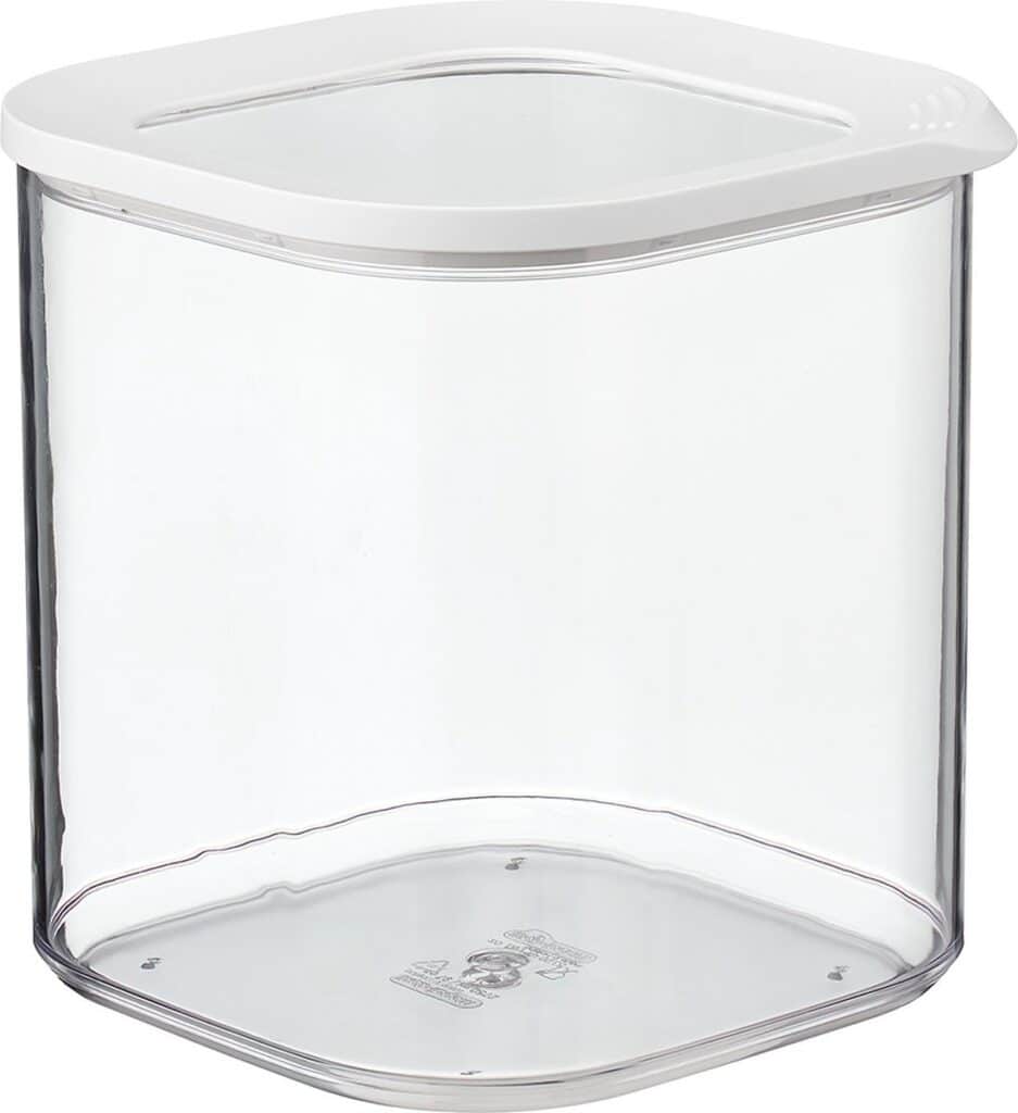 Doorzichtige voorraadpot met wit deksel.