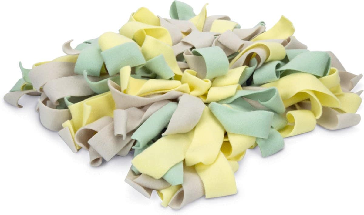 Kleurrijke stoffen slierten in geel, groen en grijs