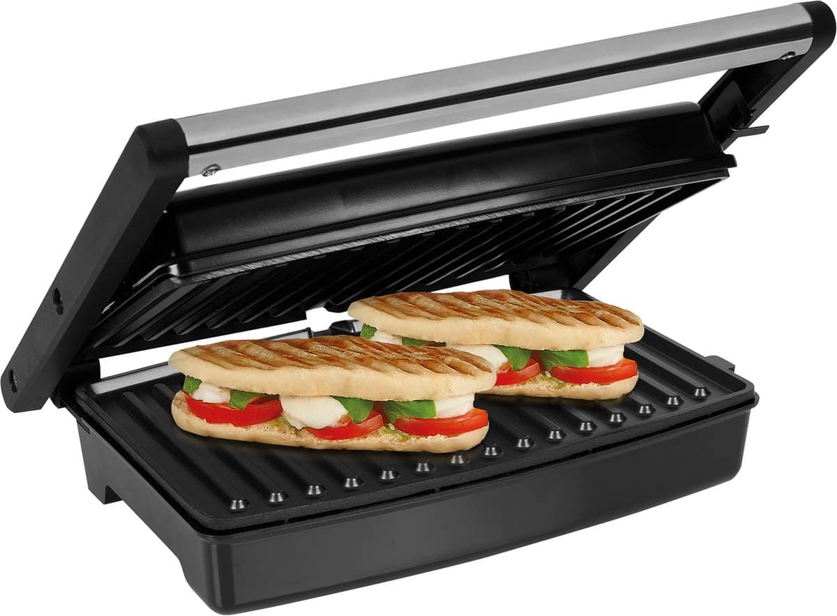 Contactgrill met panini sandwiches, tomaat en kaas.