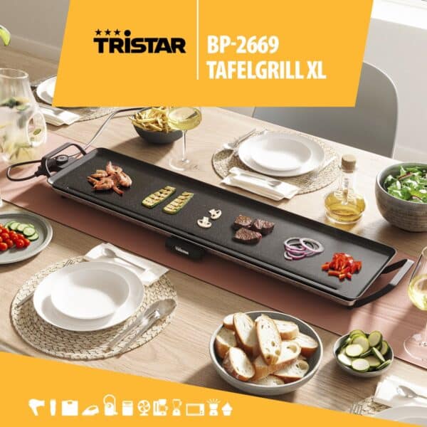 Tristar BP-2669 tafelgrill met diverse gerechten op tafel.