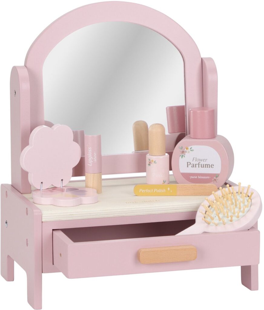 Roze houten kaptafel met schoonheidsaccessoires voor kinderen.