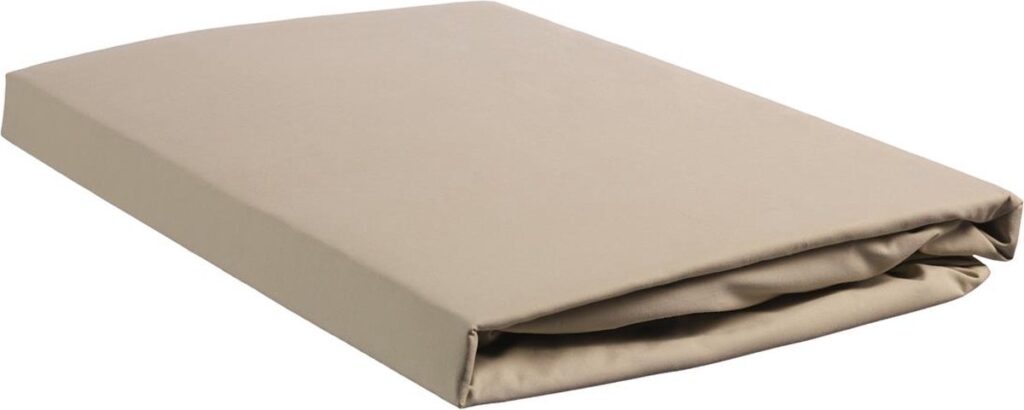 Beige folded mattress on a white background