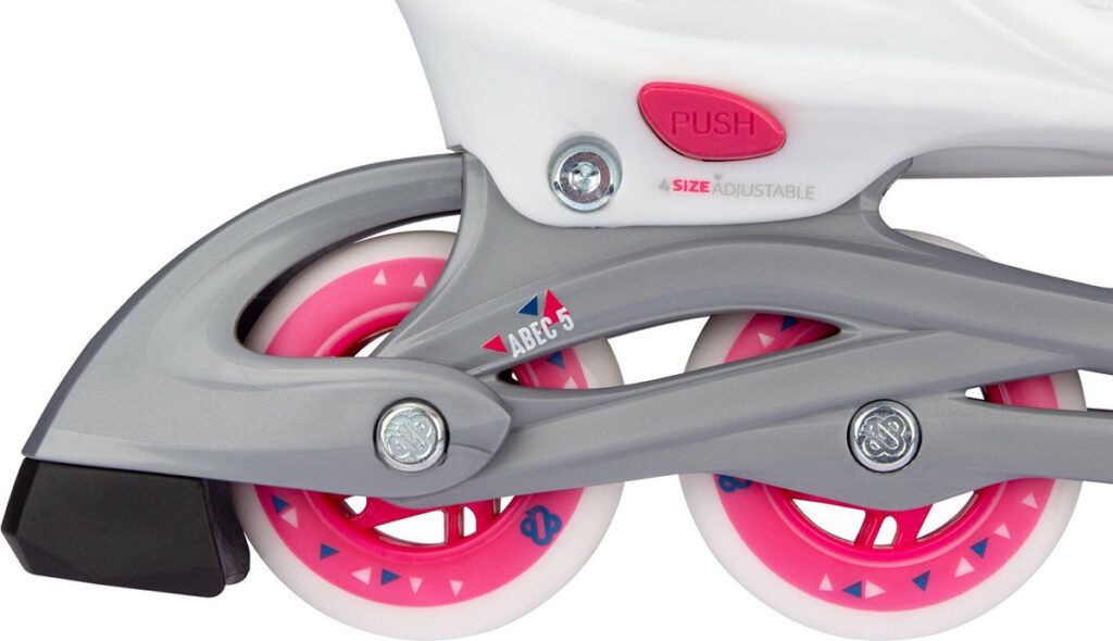 Roze wielen van verstelbare inline skates
