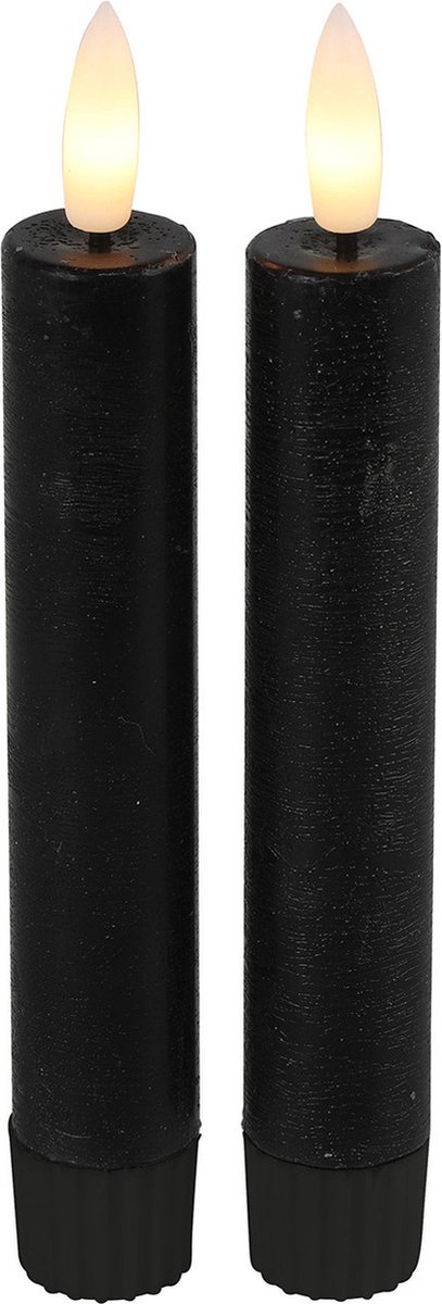 Twee zwarte kaarsen met vlam