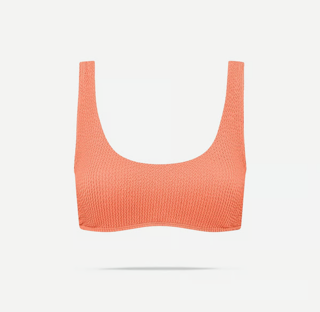 Oranje gestructureerde sport-bh op witte achtergrond