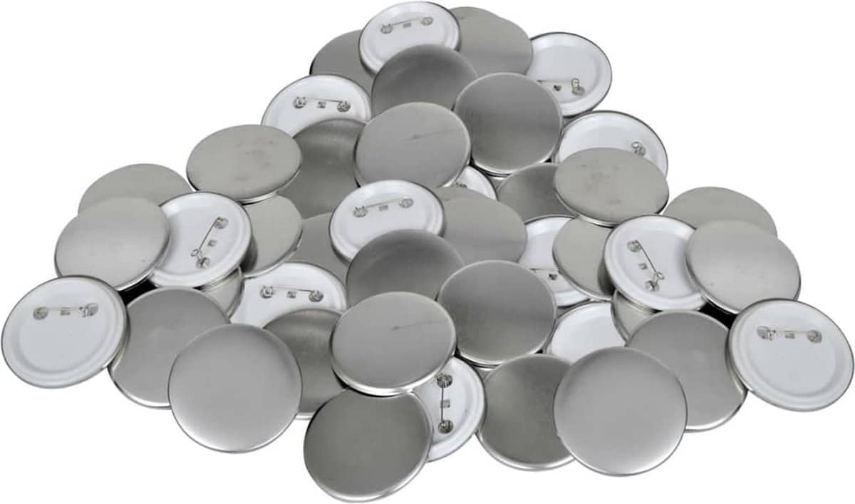 Stapel metalen lege badges met speldsluiting