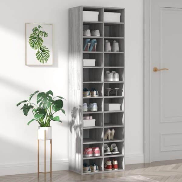 Schoenenkast met plant en decor aan de muur