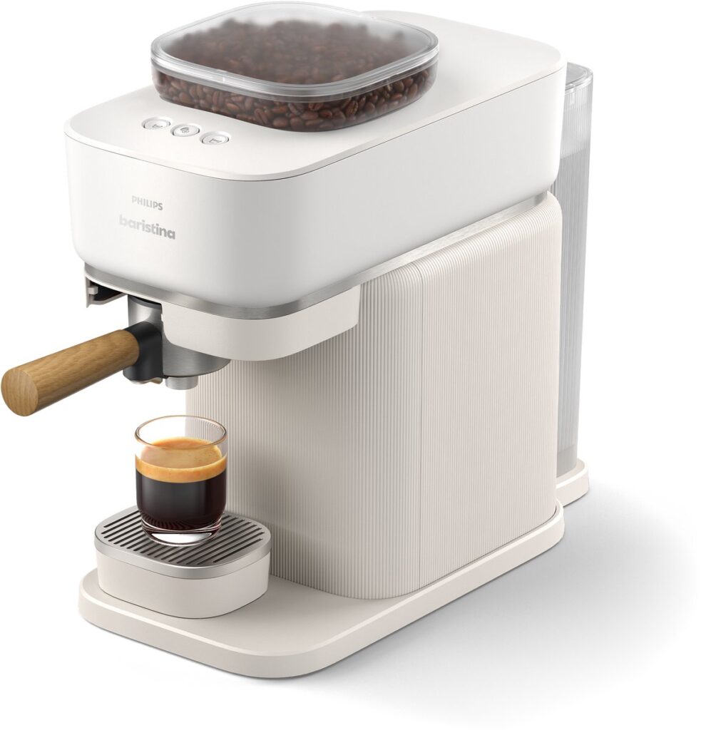 Espressomachine met vers gezette koffie en bonenbakhouder.