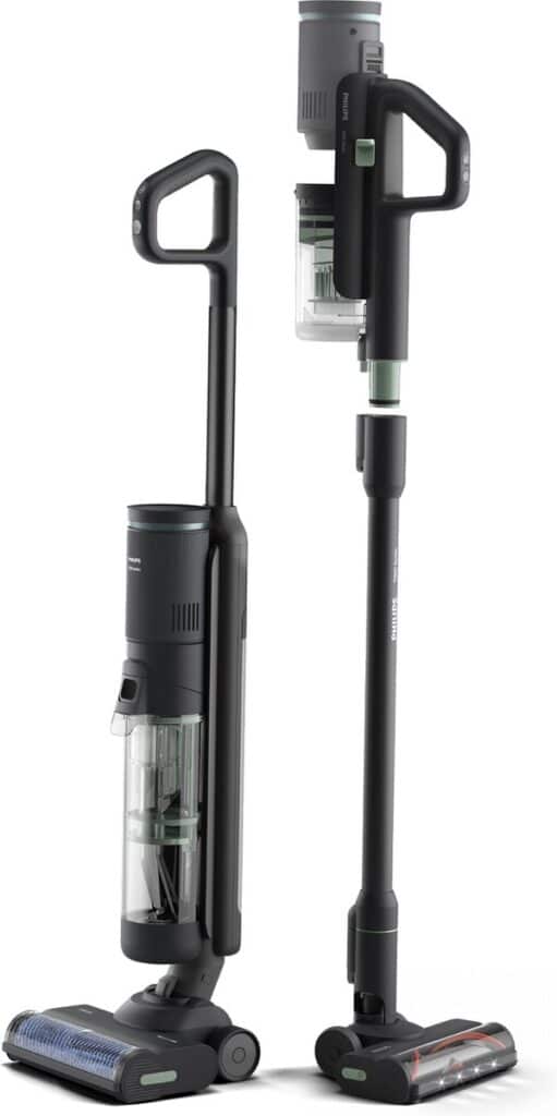 Draadloze steelstofzuiger met transparante stofreservoir.