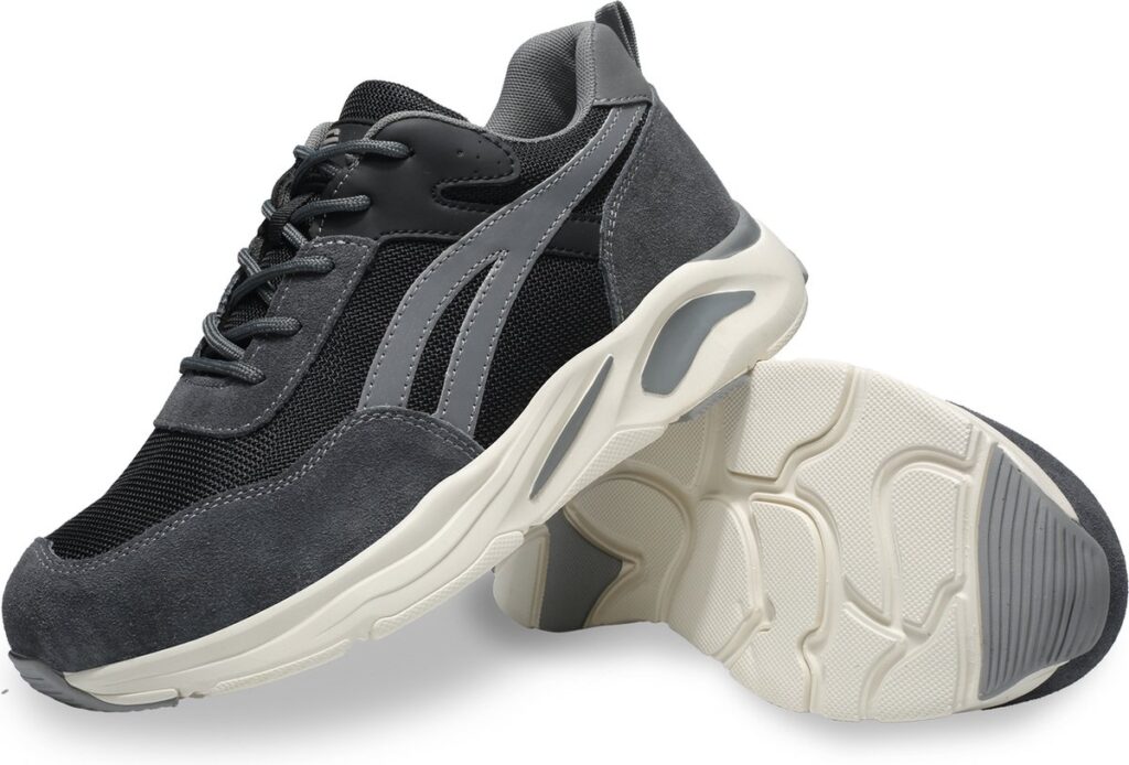Gray and black sneakers on a white background