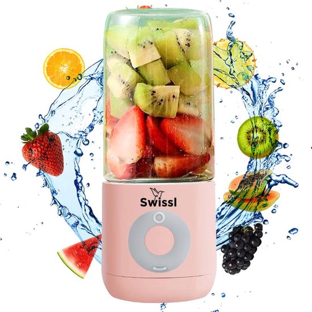 Roze blender met vers fruit en vruchtsap.
