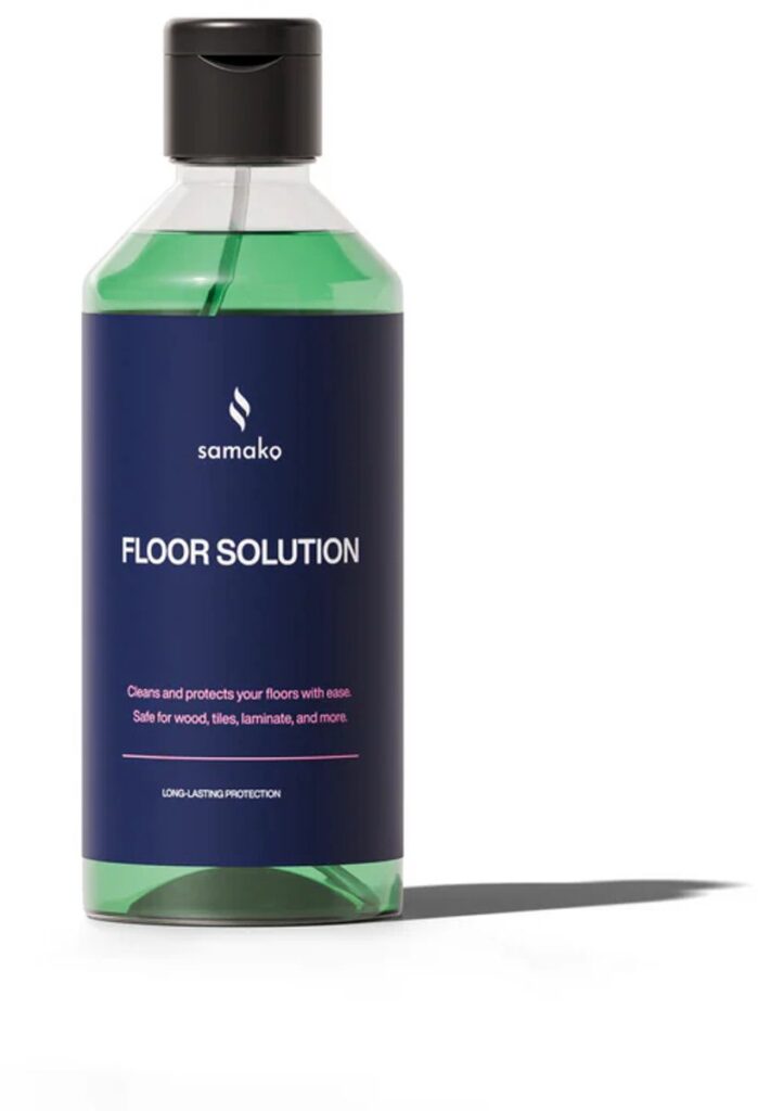 Fles vloerreiniger met groene vloeistof
