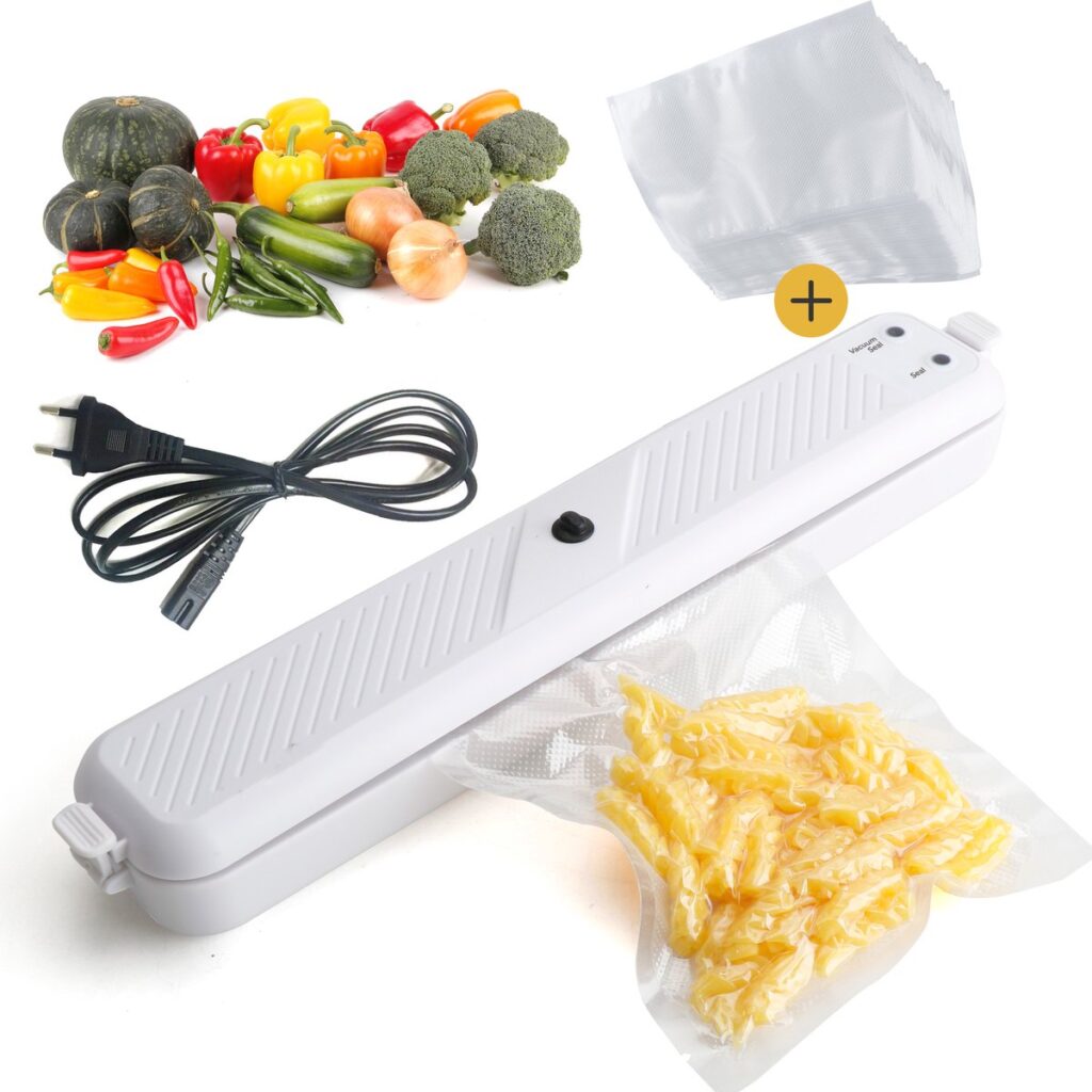 Vacumeermachine met groenten, zakken en kabel