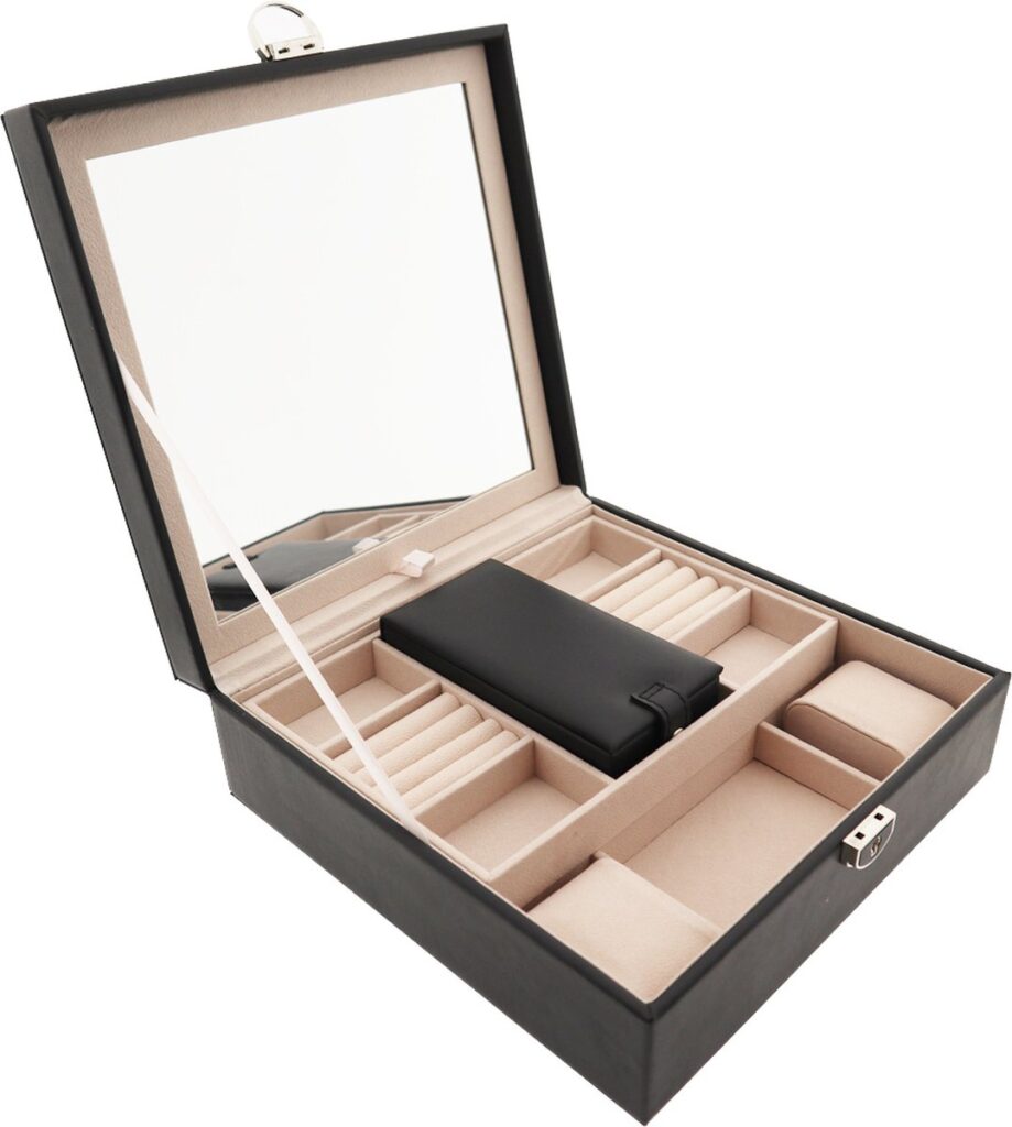 Open jewelry box with a mirror and compartments