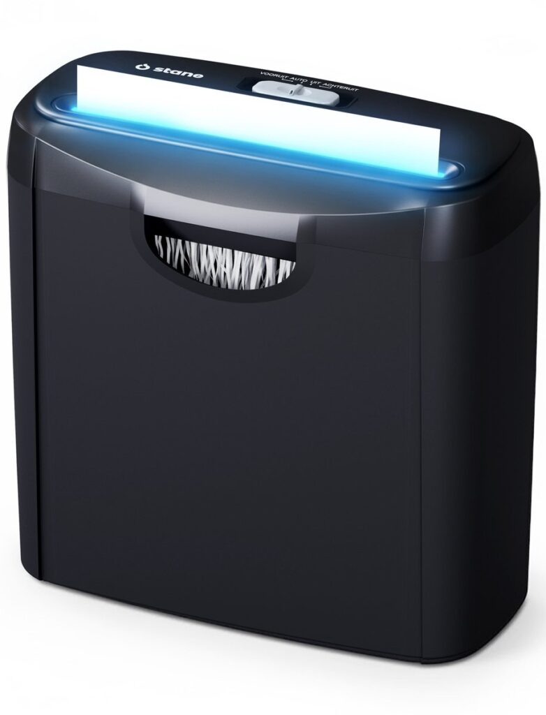 Elektrische papierversnipperaar met wit papier erin