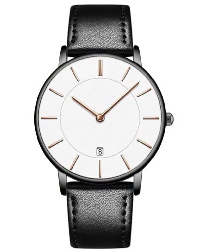 Minimalist watch with black leather strap.
