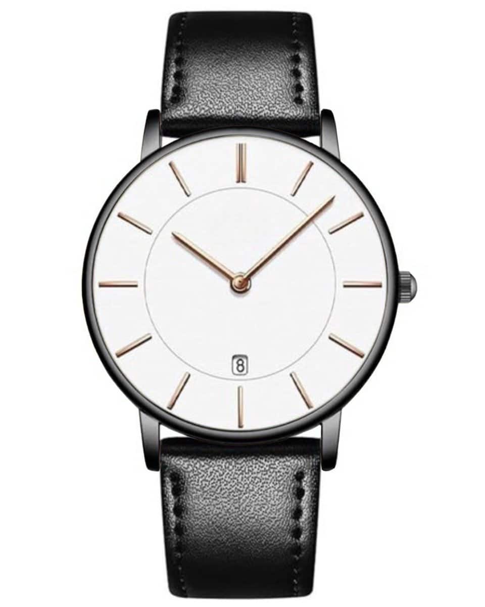 Minimalist watch with black leather strap.