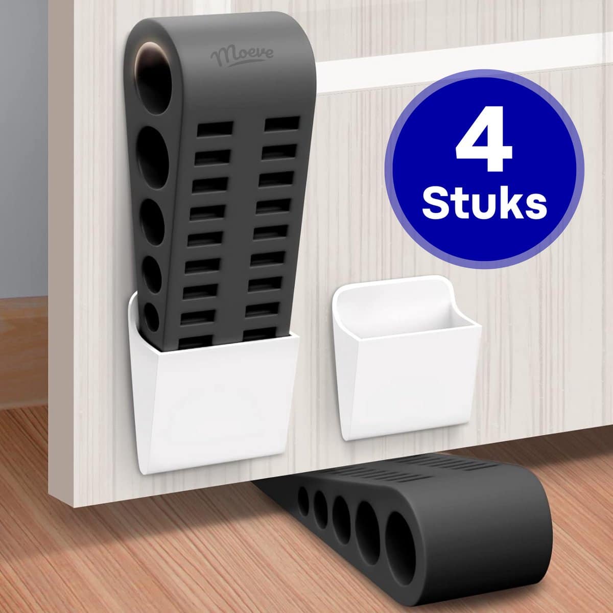 Zwarte deurstoppers set van vier stuks op houten vloer.