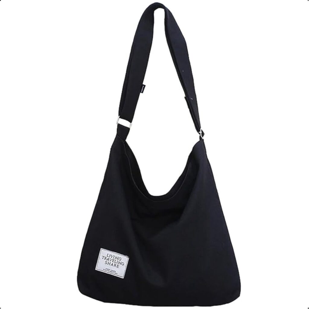 Zwarte schoudertas met tekstlabel onderaan links