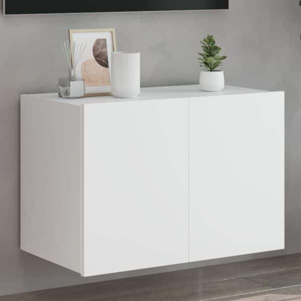 Witte hangkast met decoraties in moderne kamer.