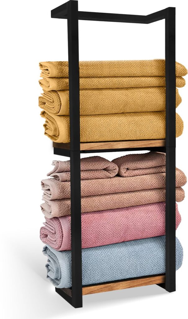Zwart handdoekenrek met opgevouwen kleurrijke handdoeken
