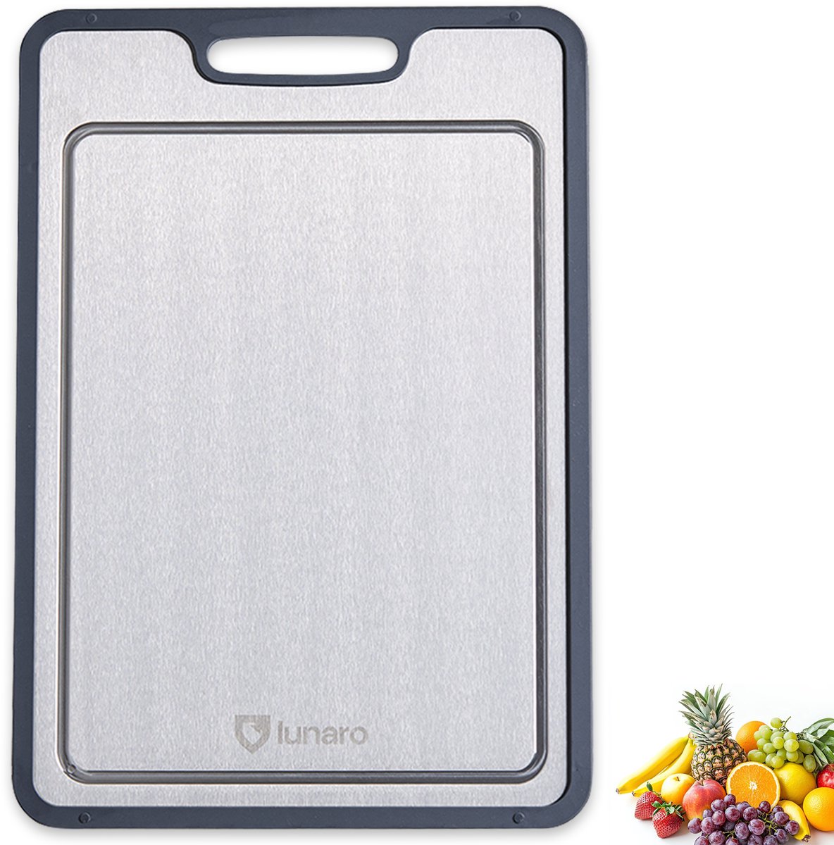 Snijplank met handgreep en vers fruit