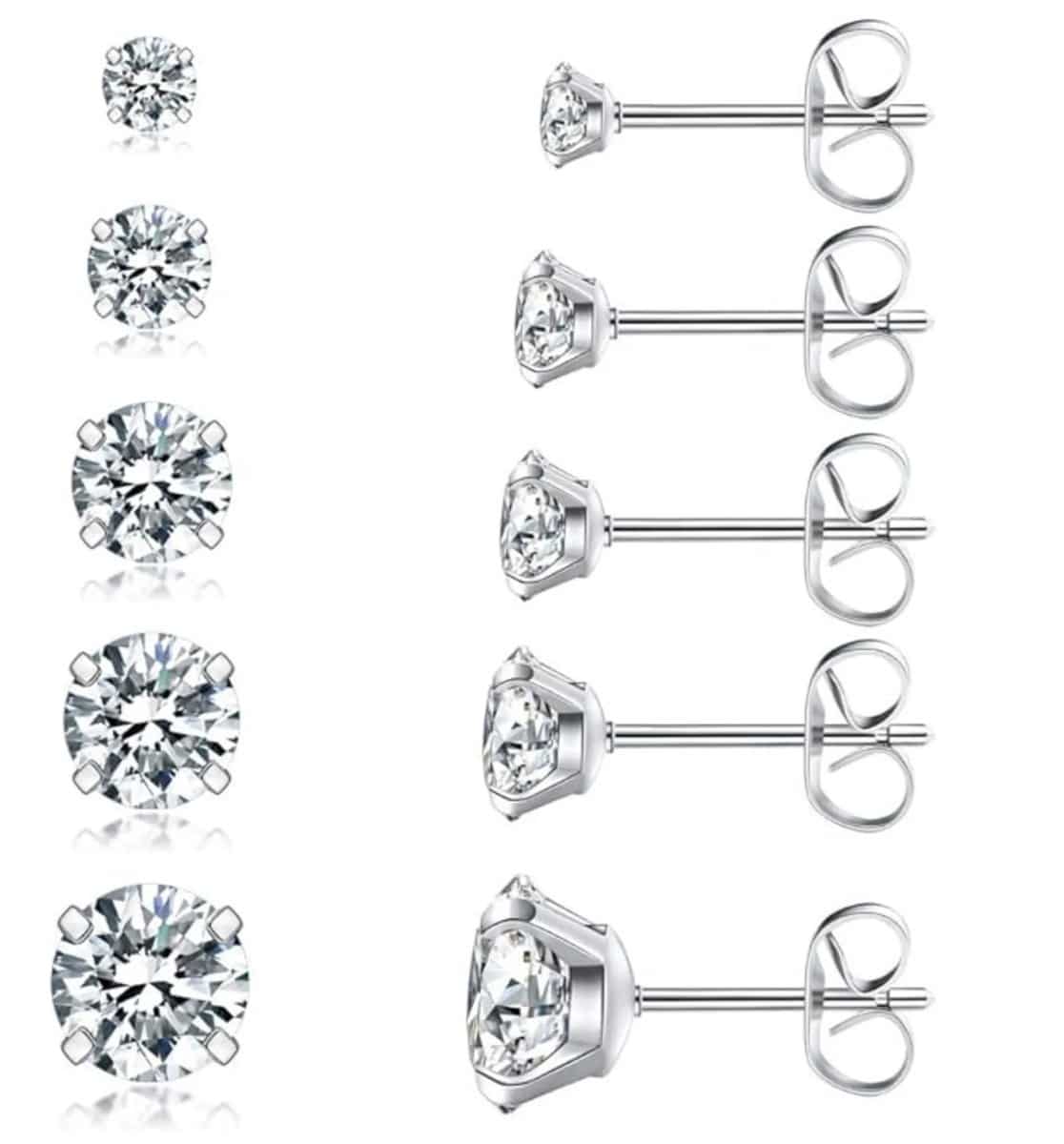 Set zilveren oorstekers met meerdere diamanten groottes