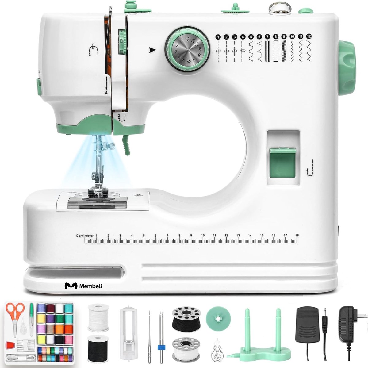 Machine à coudre blanche avec accessoires et fils